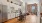 a kitchen with white cabinets