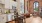 a kitchen with a brick wall