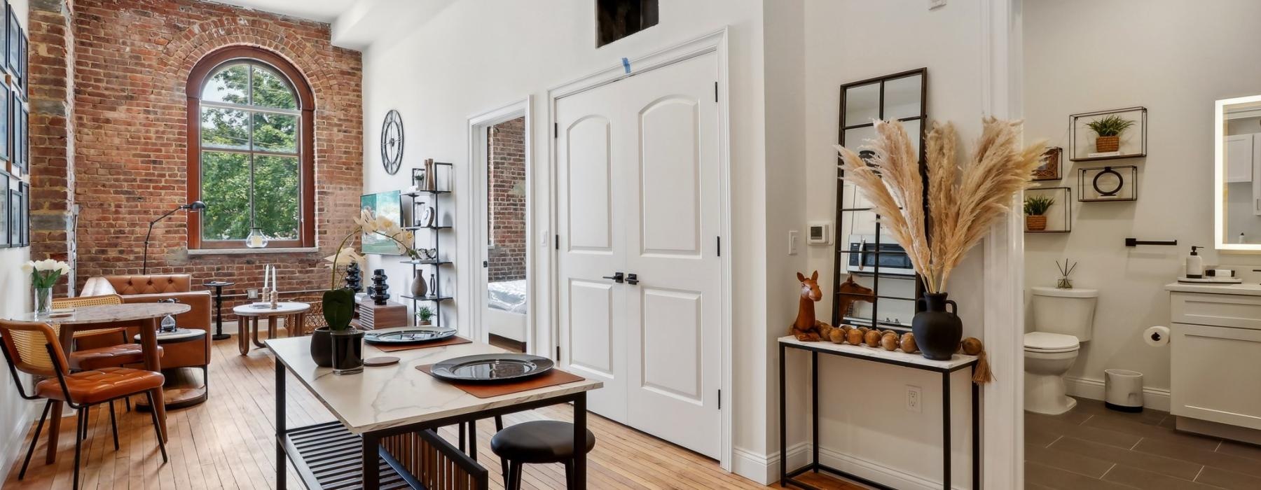 living and kitchen area with a large window