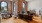 a large room with a table and chairs