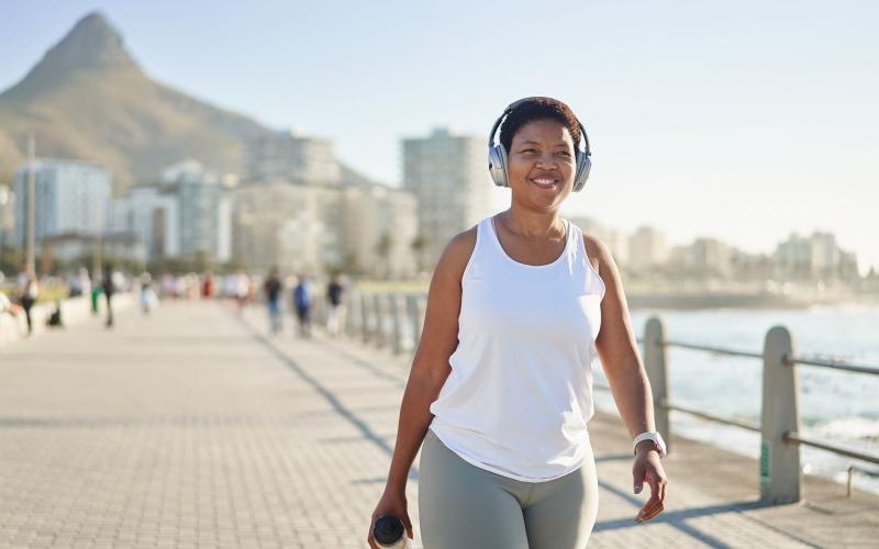 a person wearing headphones while walking